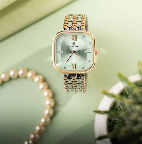 a watch on a table